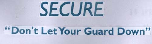 SECURE “Don't Let Your Guard Down” logo
