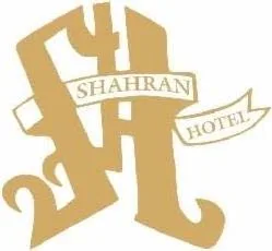 SHAHRAN HOTEL WITH SH (LABEL) logo