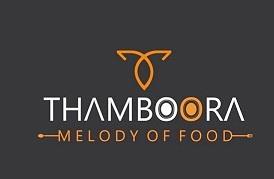 THAMBOORA WITH DEVICE logo