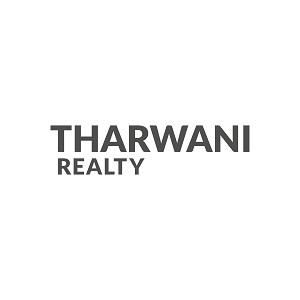 Tharwani Realty (With Device) logo