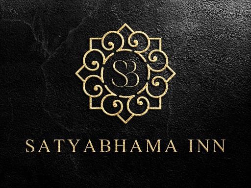 SATYABHAMA INN logo