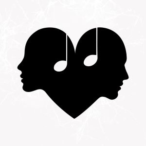 Device of 2 faces in opposing directions conjoined to form a heart with a musical note to represent headphones logo